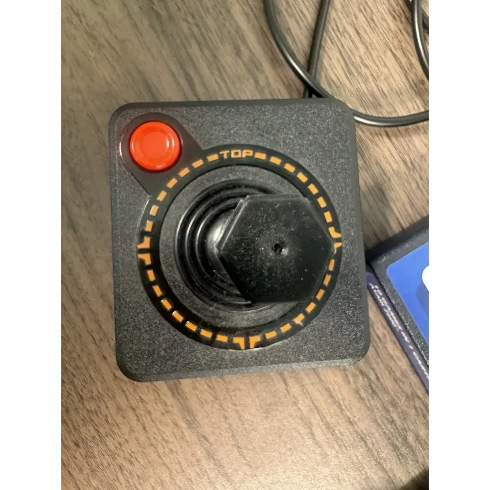 atari 2600 console with joystick, cables and one cartridge with 10 game working‎